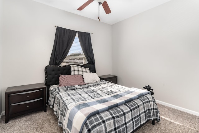 bedroom featuring light carpet and ceiling fan