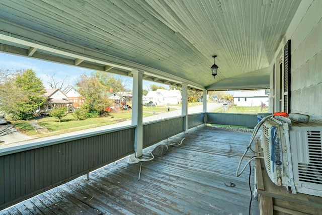 wooden deck featuring covered porch