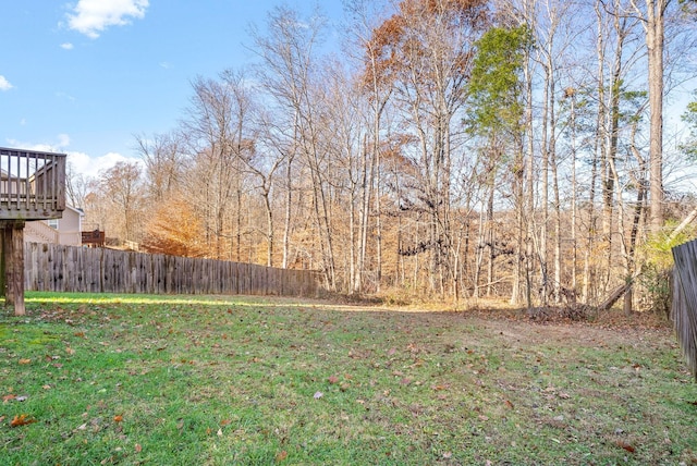 view of yard with a deck