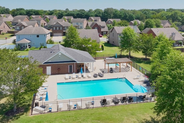 view of swimming pool with a patio