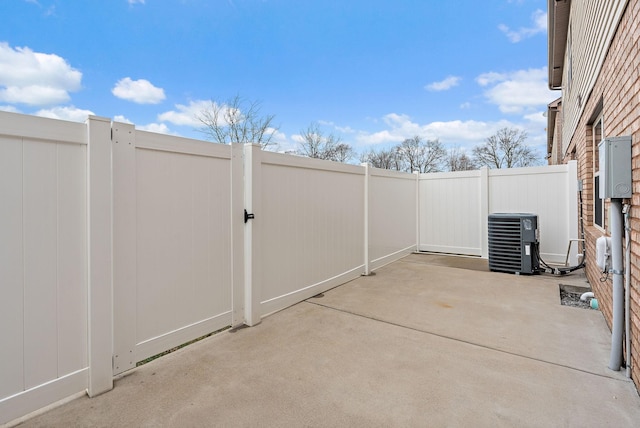 view of patio with cooling unit