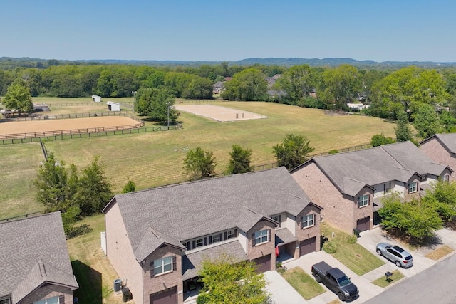 birds eye view of property featuring a rural view