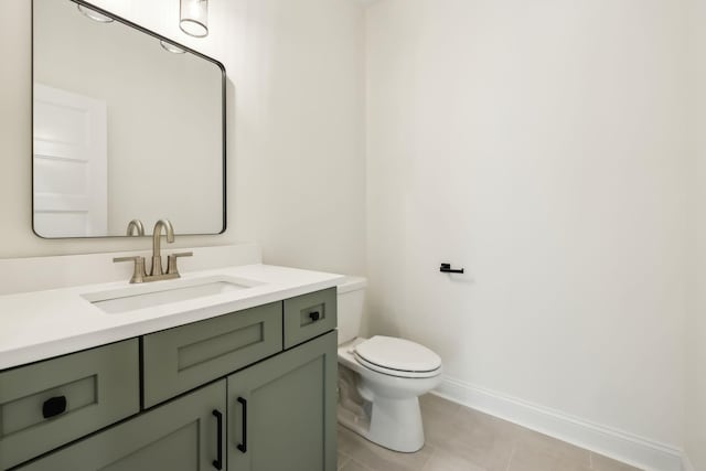 1049 Gholson Rd, Clarksville, TN 37043 - bathroom featuring tile patterned flooring, vanity, toilet, and baseboards