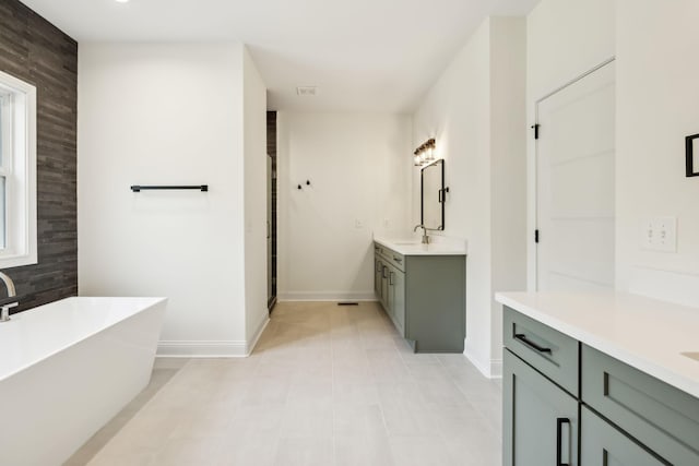 1049 Gholson Rd, Clarksville, TN 37043 - full bath featuring baseboards, vanity, a shower stall, and a freestanding bath