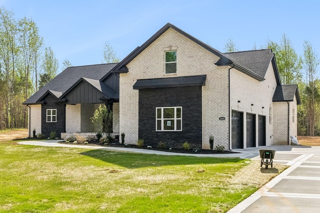 1049 Gholson Rd, Clarksville, TN 37043 - view of front of house featuring an attached garage, a front lawn, and concrete driveway