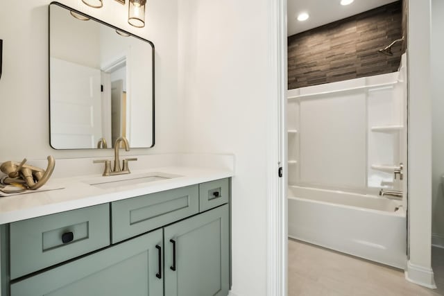 1049 Gholson Rd, Clarksville, TN 37043 - full bath featuring shower / bathing tub combination, wood finished floors, vanity, and recessed lighting