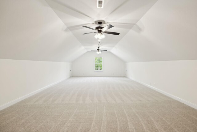 1049 Gholson Rd, Clarksville, TN 37043 - bonus room featuring baseboards, vaulted ceiling, visible vents, and light colored carpet