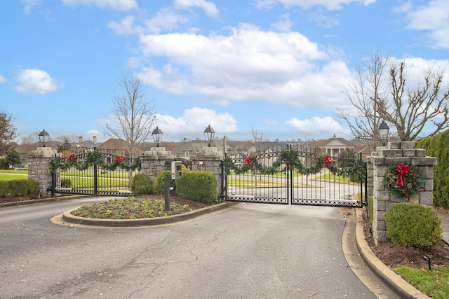 view of gate with a residential view