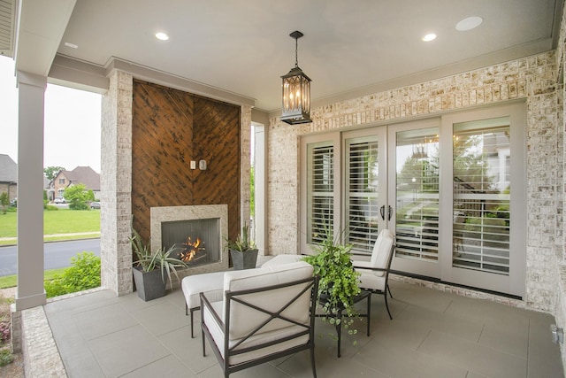 1141 Landing Pvt Ct, Gallatin, TN 37066 - view of patio / terrace featuring a warm lit fireplace