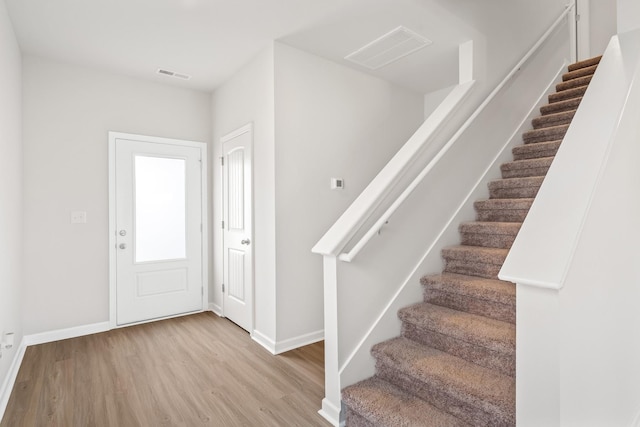 foyer with light wood-type flooring