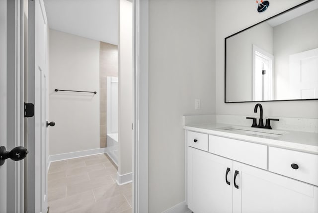 bathroom with shower / bathing tub combination, vanity, and tile patterned floors