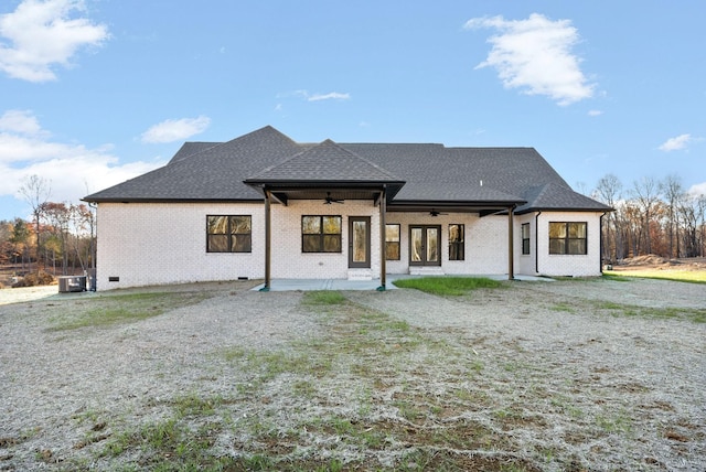 back of property with a patio, central AC unit, ceiling fan, and a lawn