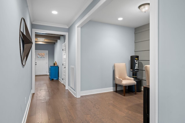 hall featuring dark hardwood / wood-style flooring and ornamental molding