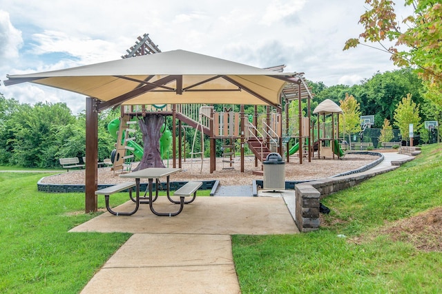 community jungle gym with a lawn