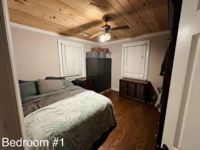 bedroom with ornamental molding, dark wood-type flooring, ceiling fan, and wooden ceiling