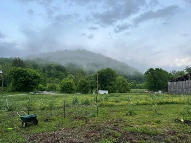 exterior space with a rural view