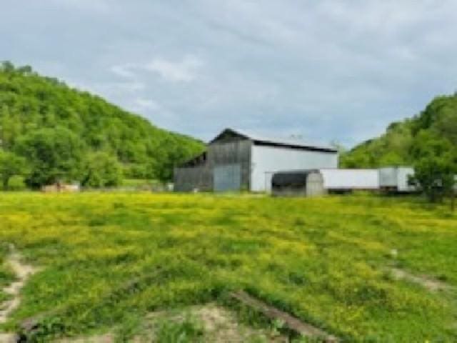 1611 Knob Creek Rd, Celina, TN 38551 - view of yard featuring an outdoor structure and an outbuilding