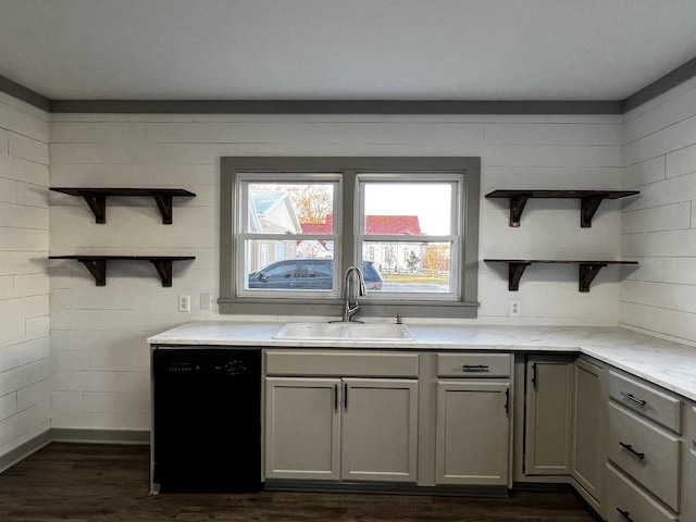 kitchen featuring dark hardwood / wood-style flooring, dishwasher, gray cabinets, and sink