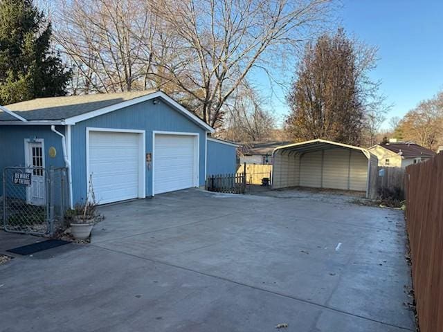 garage with a carport