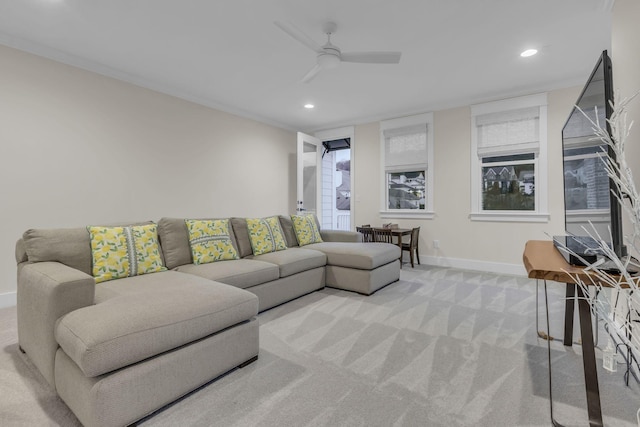 living room with light colored carpet and ceiling fan