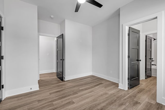 interior space featuring ceiling fan and light hardwood / wood-style flooring