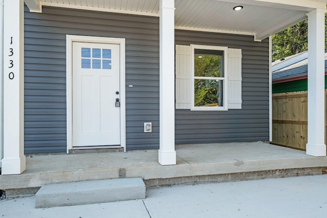 entrance to property with covered porch