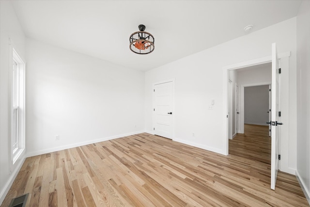 unfurnished bedroom with light hardwood / wood-style flooring