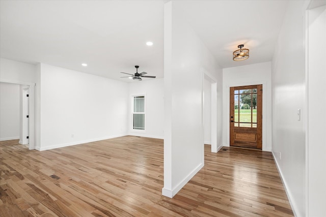 foyer featuring ceiling fan and light hardwood / wood-style floors