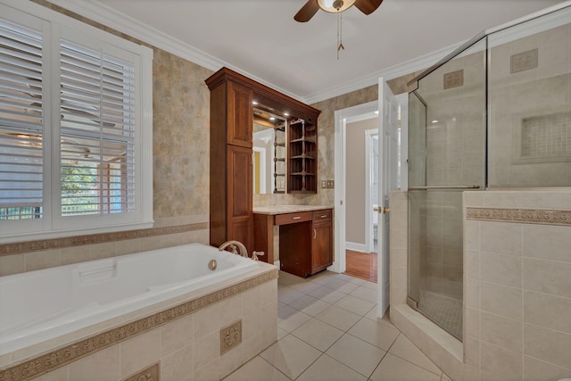 bathroom featuring vanity, tile patterned floors, crown molding, ceiling fan, and shower with separate bathtub