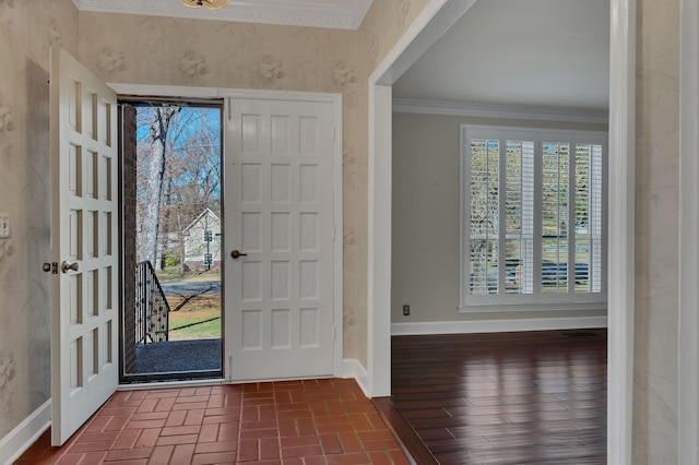 foyer with dark hardwood / wood-style floors and ornamental molding