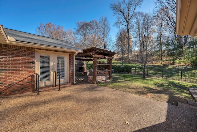 view of yard with french doors