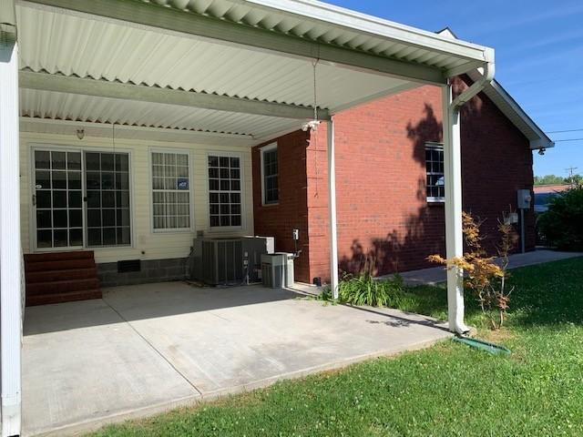 view of patio with central AC unit