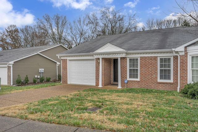 view of front of house featuring a garage and a front lawn