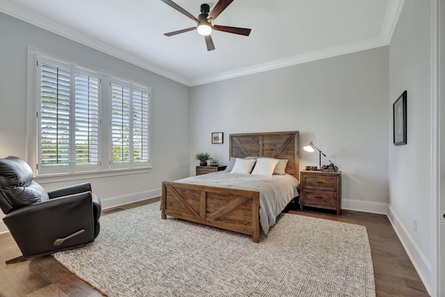 bedroom with ceiling fan, dark hardwood / wood-style floors, and ornamental molding