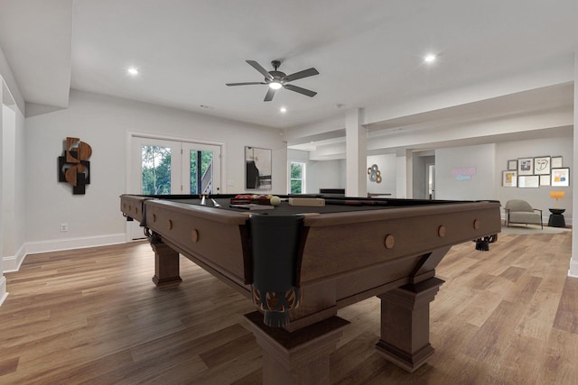 recreation room with light wood-type flooring, ceiling fan, and billiards