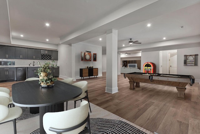 dining space featuring ceiling fan, wood-type flooring, and billiards