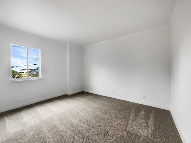 unfurnished room with carpet floors