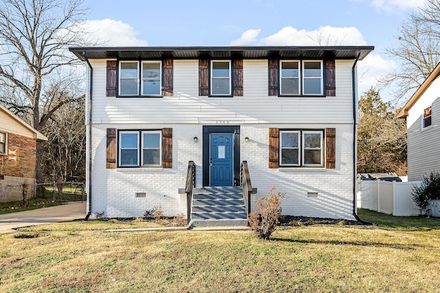 view of front of house with a front lawn