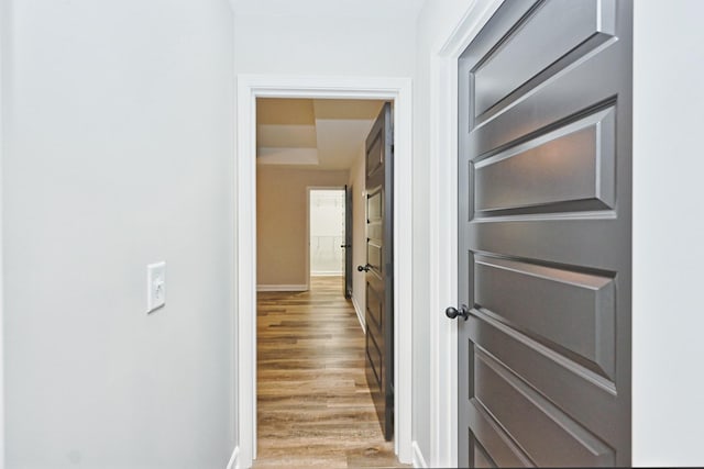 hallway featuring hardwood / wood-style floors