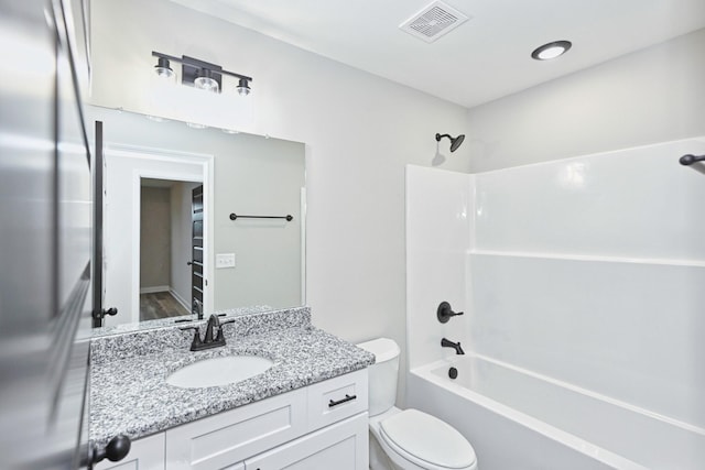 full bathroom featuring shower / tub combination, hardwood / wood-style floors, vanity, and toilet