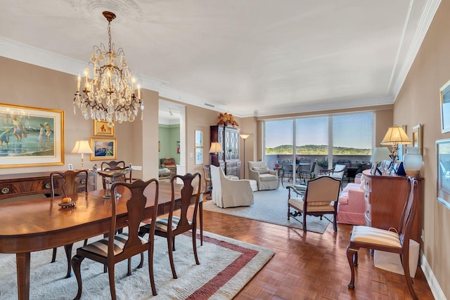 dining area featuring a chandelier, parquet floors, and ornamental molding