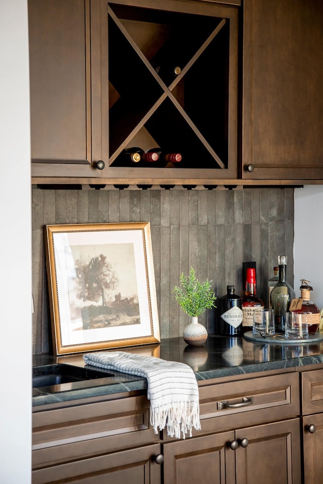 interior space with dark stone countertops