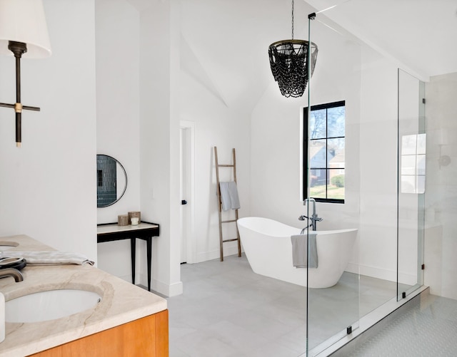 full bathroom featuring high vaulted ceiling, a shower, a freestanding tub, and vanity