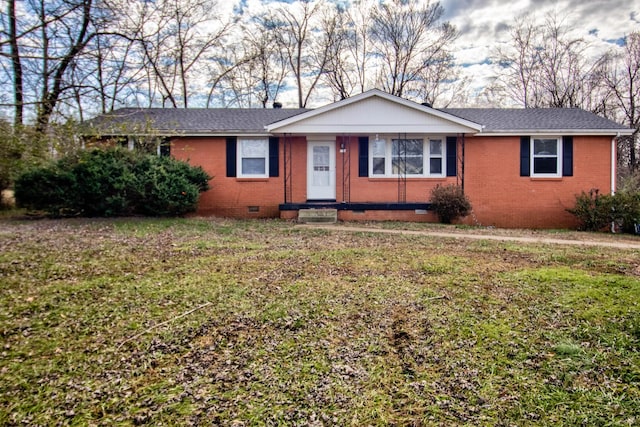 single story home with a front yard