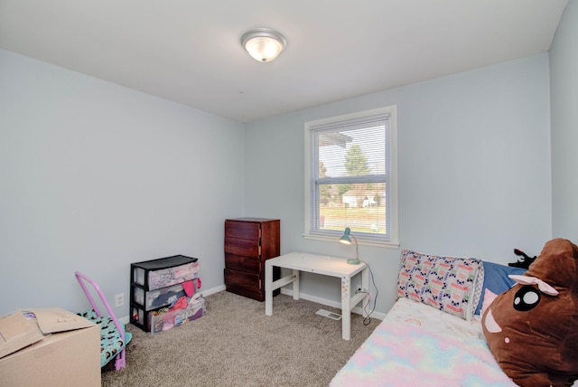 bedroom featuring light colored carpet