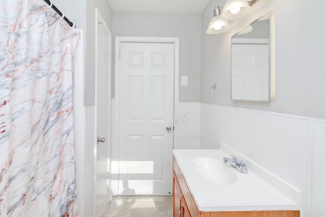 bathroom featuring vanity and walk in shower