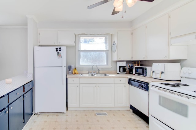 kitchen with white cabinetry, white appliances, and sink