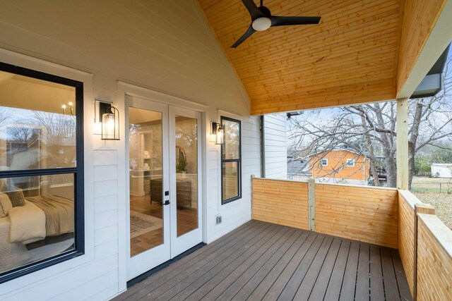 wooden deck featuring french doors and ceiling fan