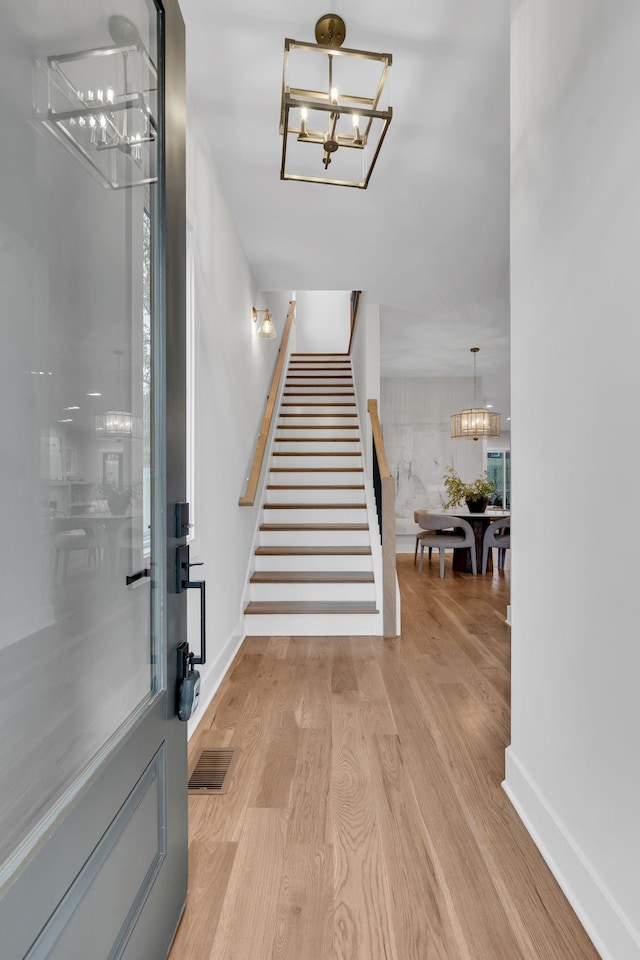 entrance foyer featuring light wood-type flooring