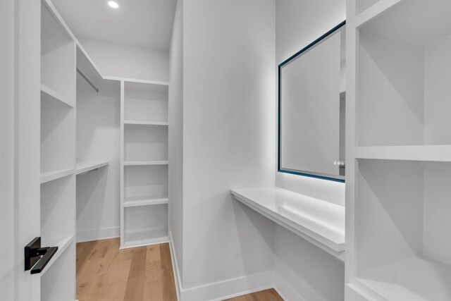 spacious closet with light wood-type flooring